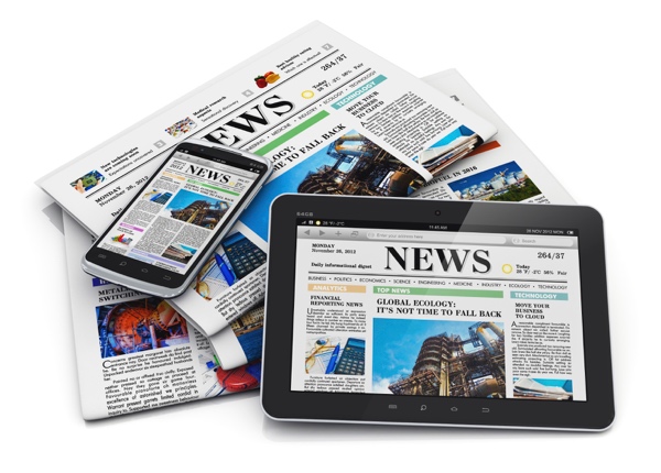 Stack of newspapers and devices